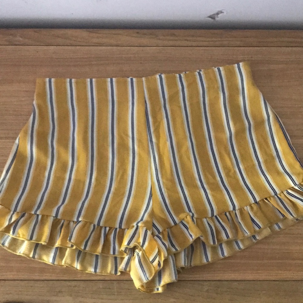 Yellow shorts w/ blue/white stripes